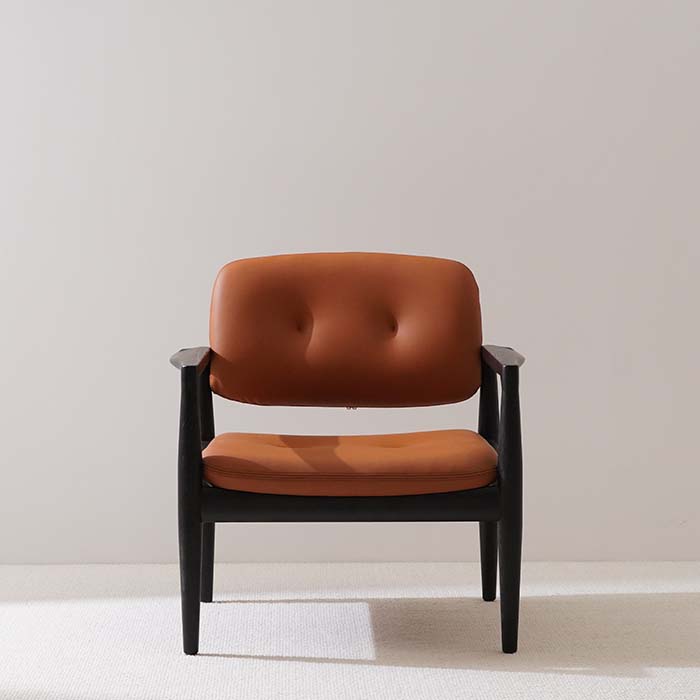 Moderne bruin lederen gestoffeerde fauteuil met open rug en accent 