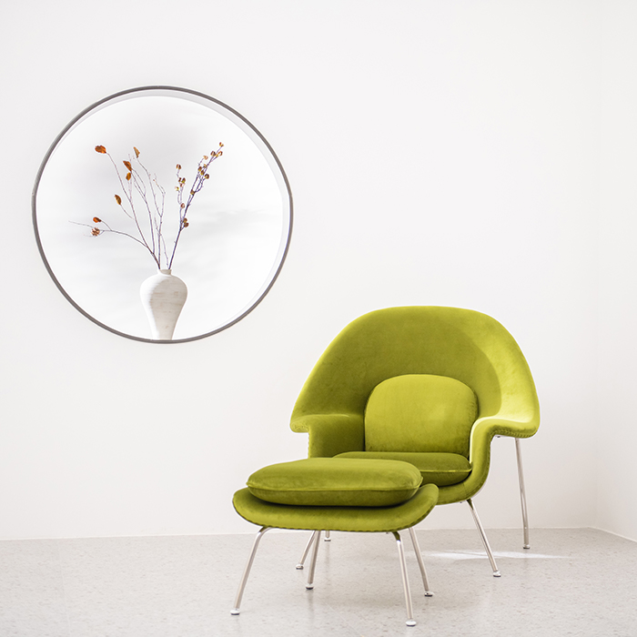 Nodic Womb Lounge Chair en Ottomaanse stoel met kussens 