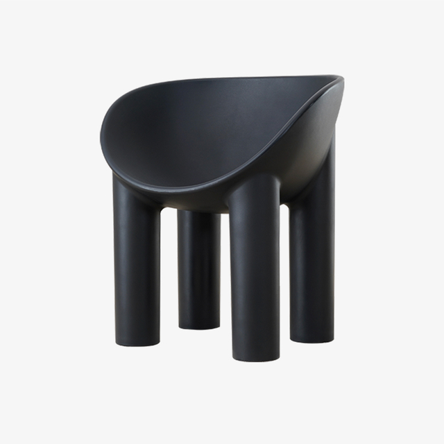 Moderne Roly Poly fauteuil in zwart met olifantenpoot