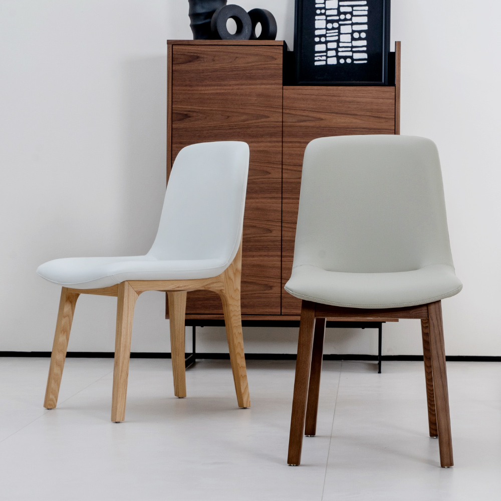 Moderne wit lederen gestoffeerde eetkamerstoelen met houten frame