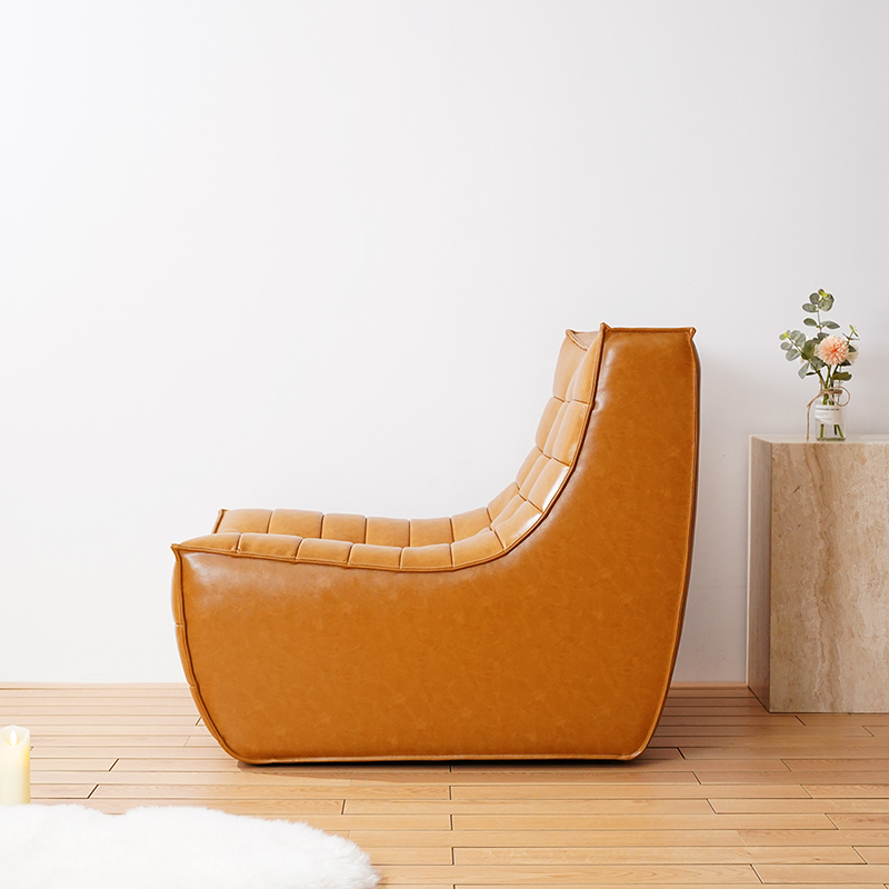 Moderne leren enkele luie fauteuil, gestoffeerde armloze loungestoel
