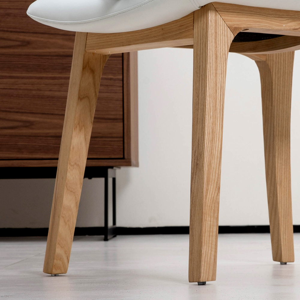 Moderne wit lederen gestoffeerde eetkamerstoelen met houten frame